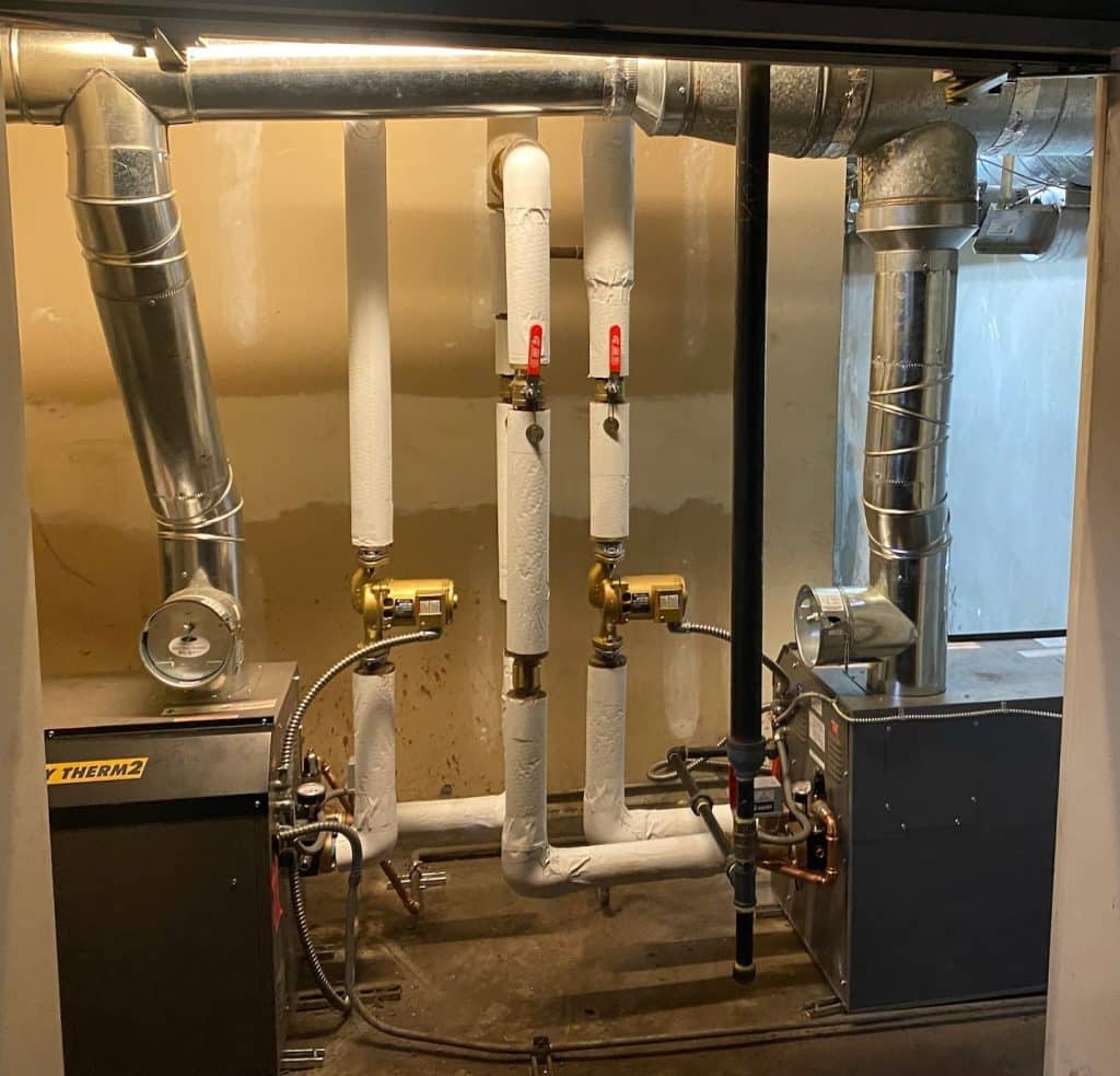 Metal pipes going towards boiler